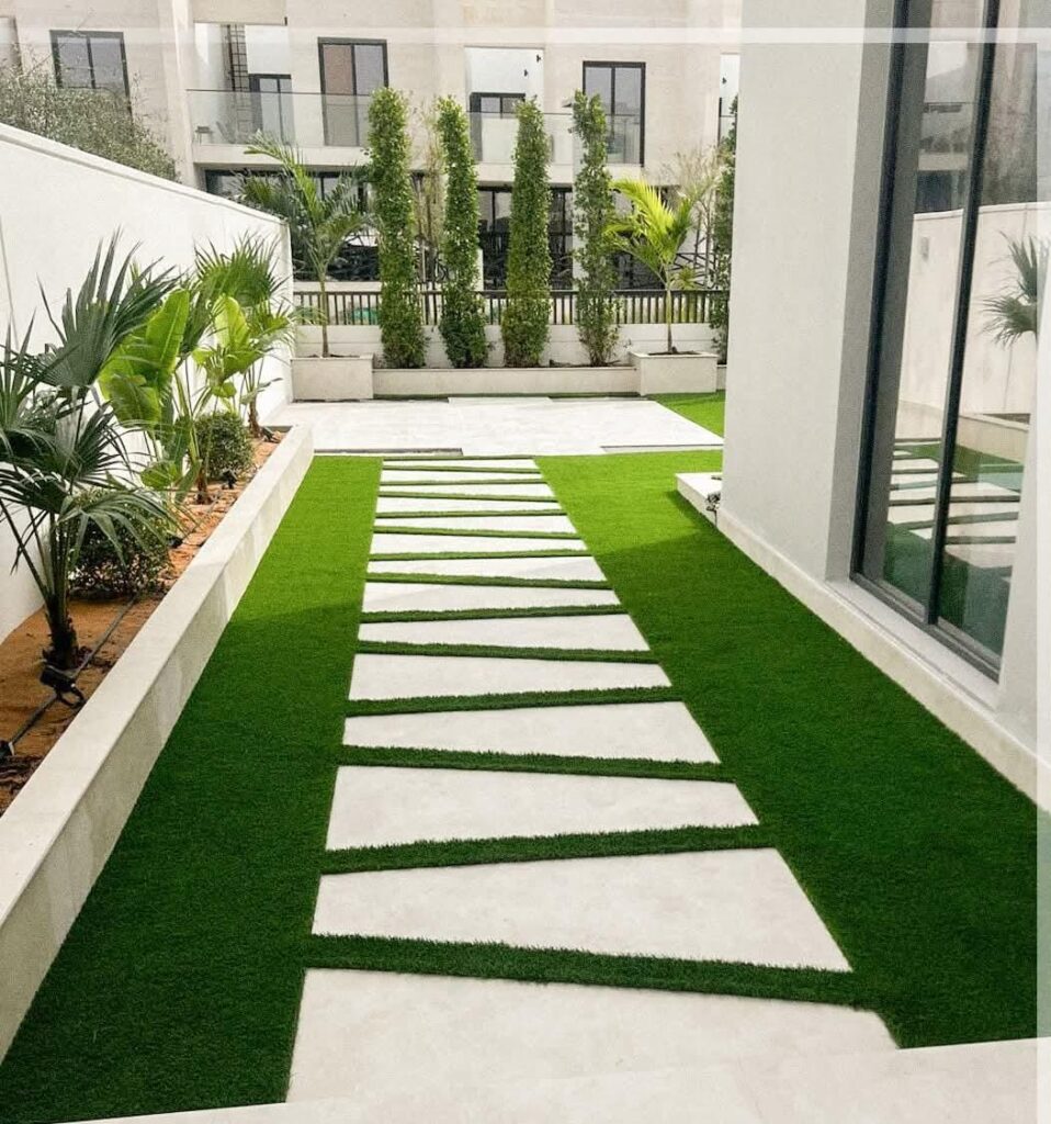 Expert landscaping team transforming outdoor spaces into beautiful gardens in Al Furjan Dubai