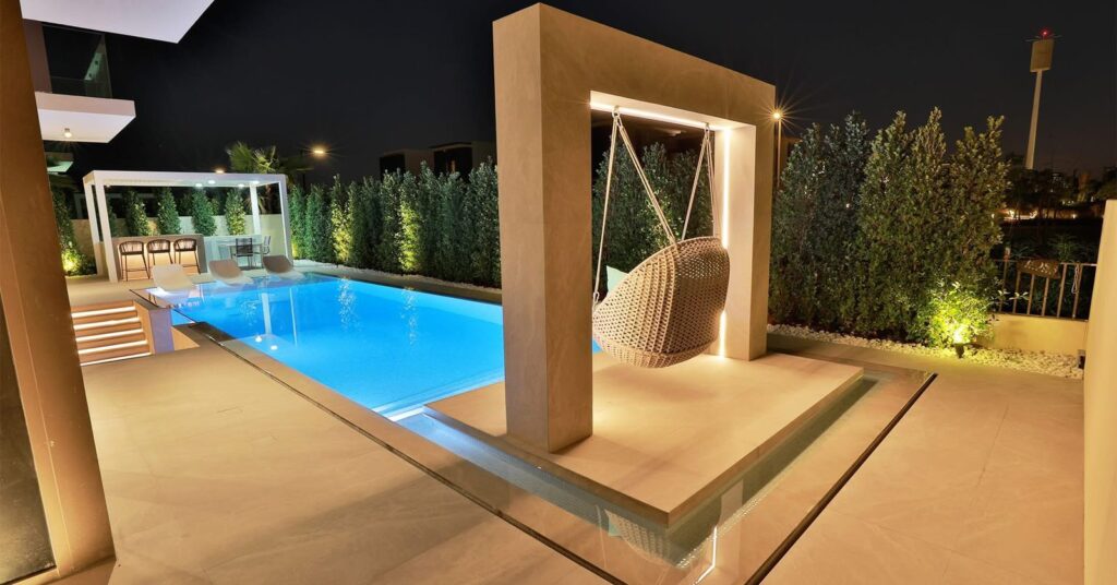 Professional swimming pool cleaning service in Palm Jumeirah Dubai with crystal clear water
